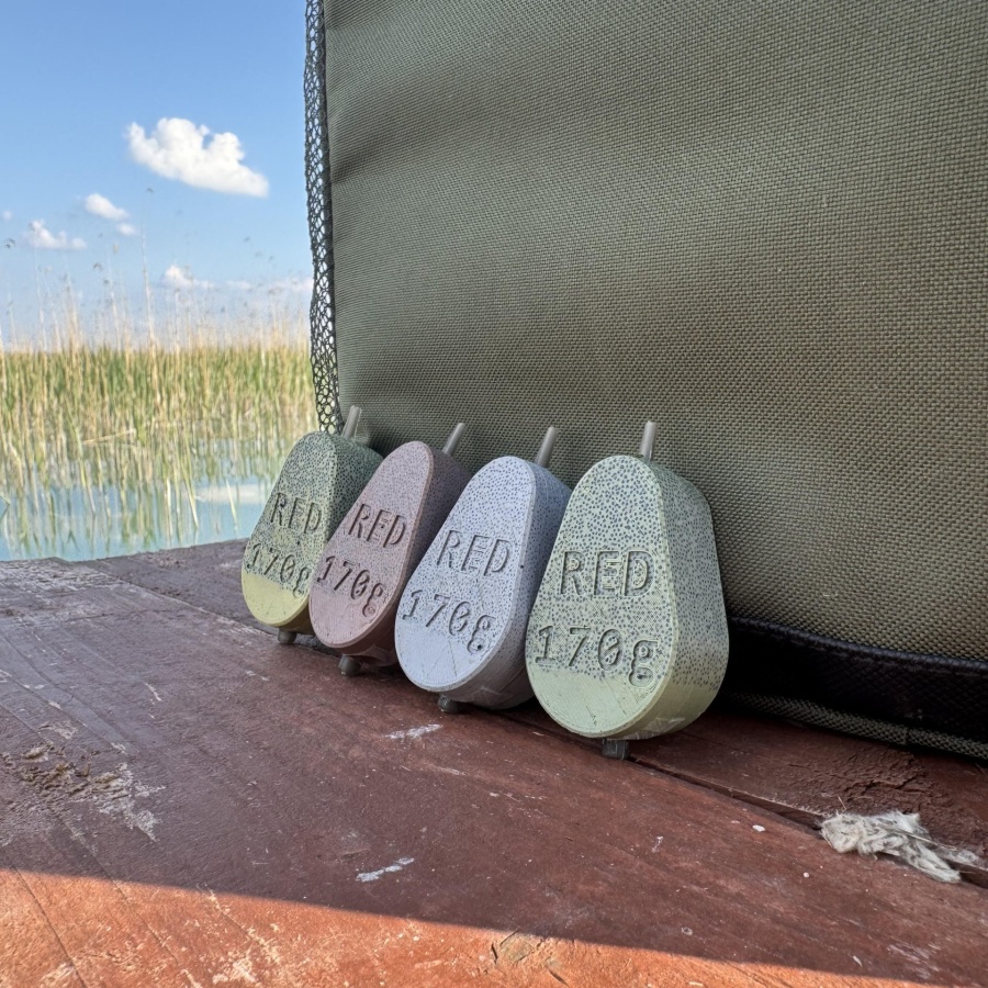 Red Sinker Inline horgász súlyok 170g színes változatban a vízparton